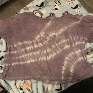 It’s purple and white. It’s from American Eagle and it’s a x-small